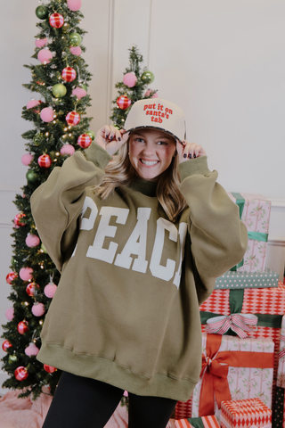 Merry Put It On Santa’s Tab Trucker Hat
