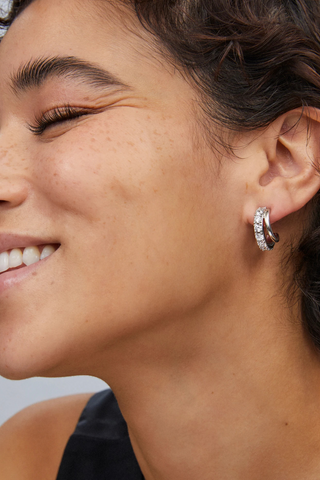 Livy Silver Huggie Earrings in White Crystal